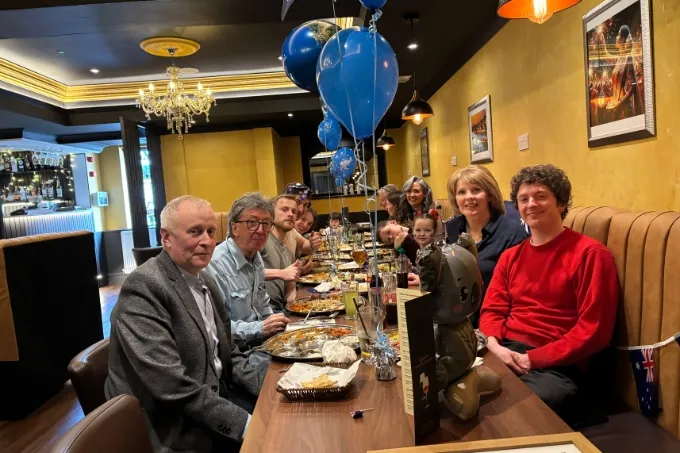 Guests enjoying a celebratory dinner at Roy's Indian Kitchen